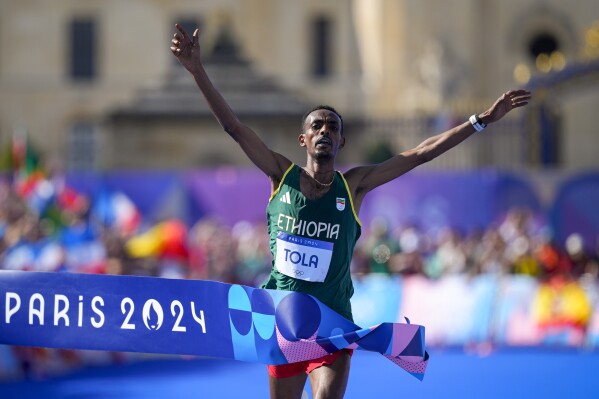 Tamirat Tola wins men’s Marathon 2024: Schedule&Results,Height,Birth place