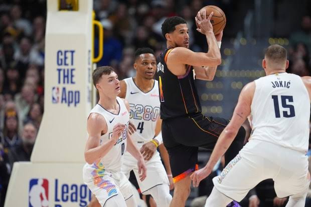 Nikola Jokic embraces Kevin Durant: Scoring Historical 31-21-22 Suns