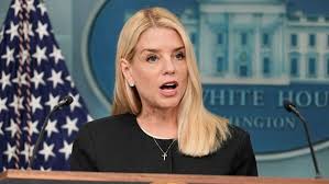 Elizabeth baxter doj Employee FIRED Over National Guard Gesture: Shocking Trump